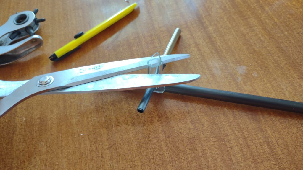 Cutting off any excess tubing
