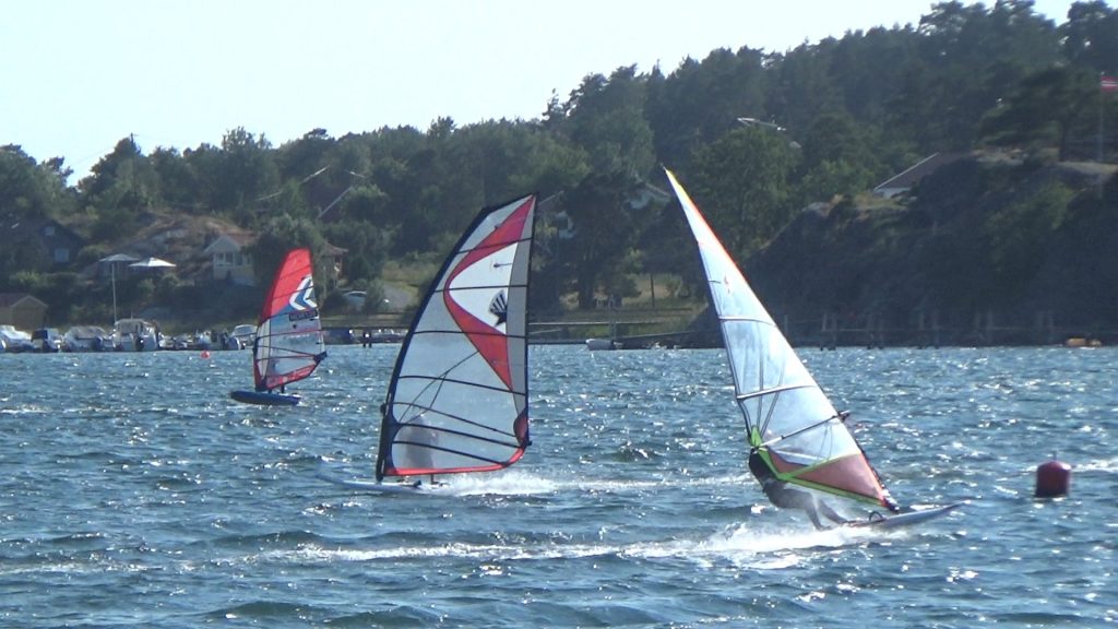 Windsurfers playing on the water