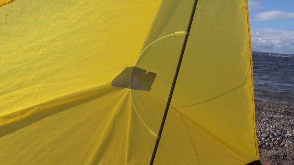 The glass fibre rod taped to the sail