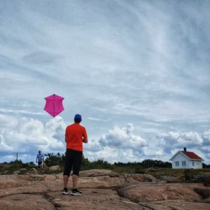 Flying a pink Rokkaku